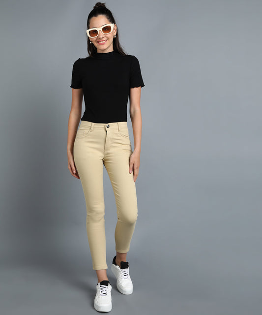 Beige slim fit 5- pocket high rise jeans, clean look, zip fly with button closure, waistband with belt loops