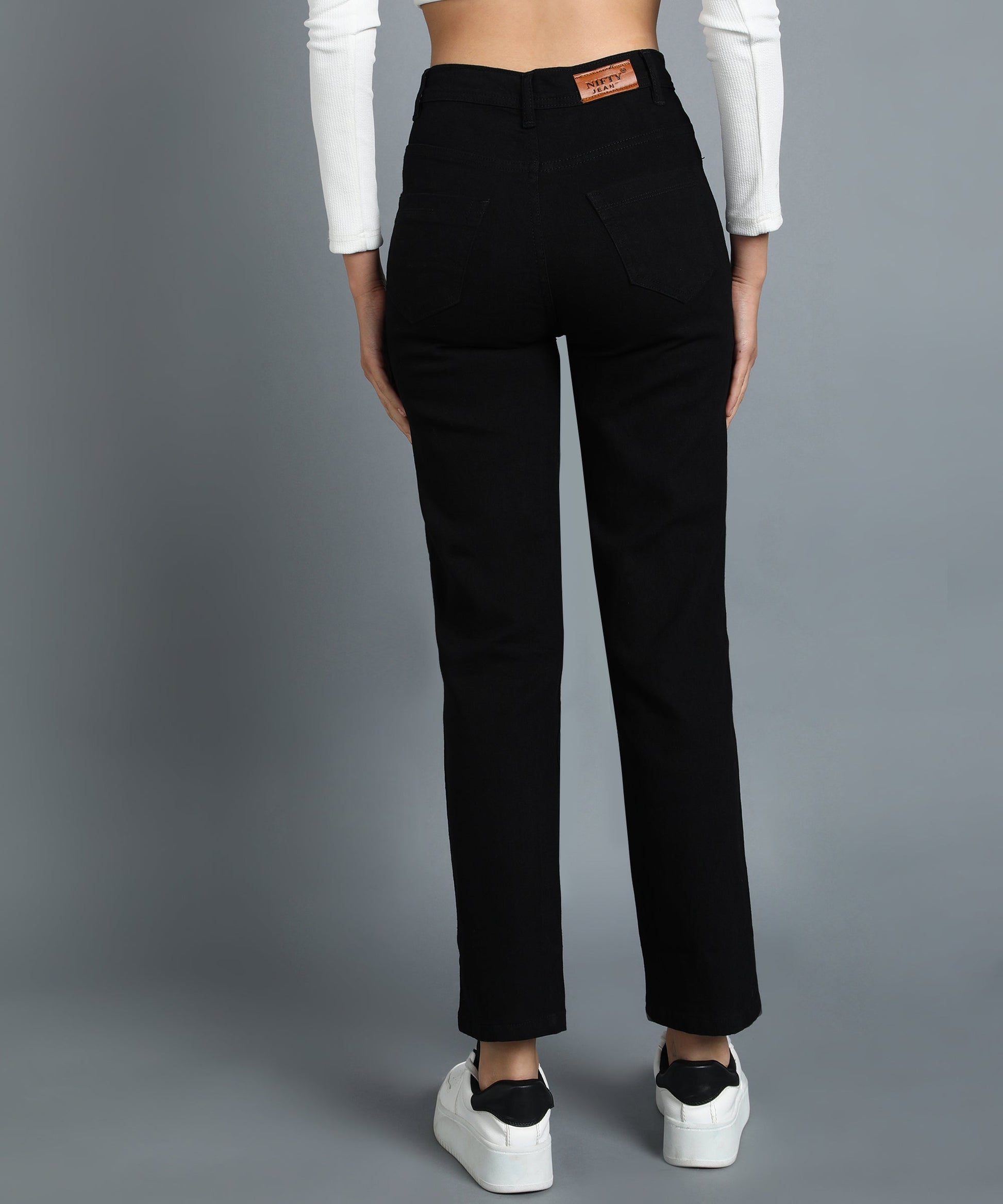 Black straight fit 5- pocket high rise jeans, clean look, zip fly with button closure, waistband with belt loops