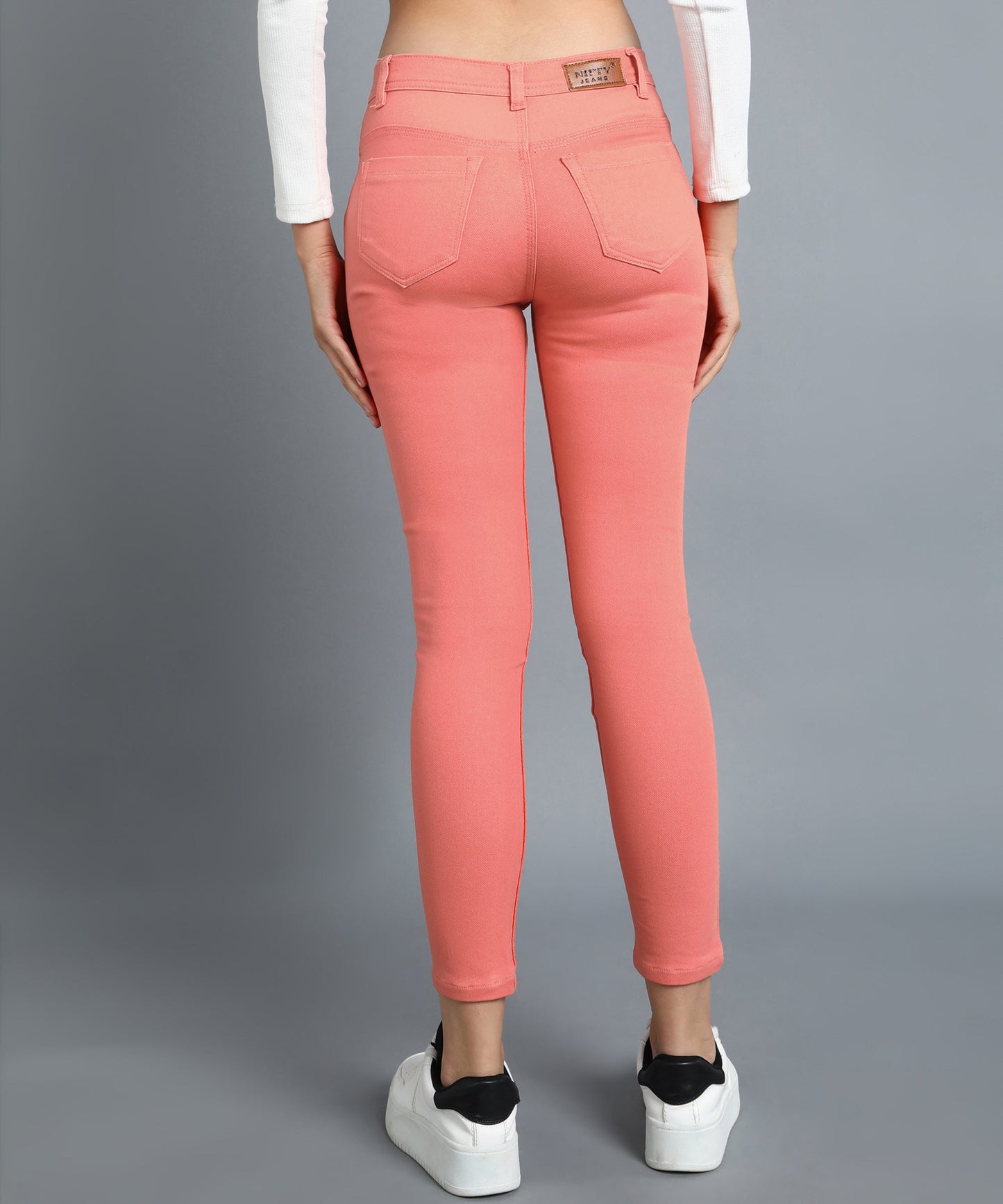 Tomato Red slim fit 5- pocket high rise jeans, clean look, zip fly with button closure, waistband with belt loops