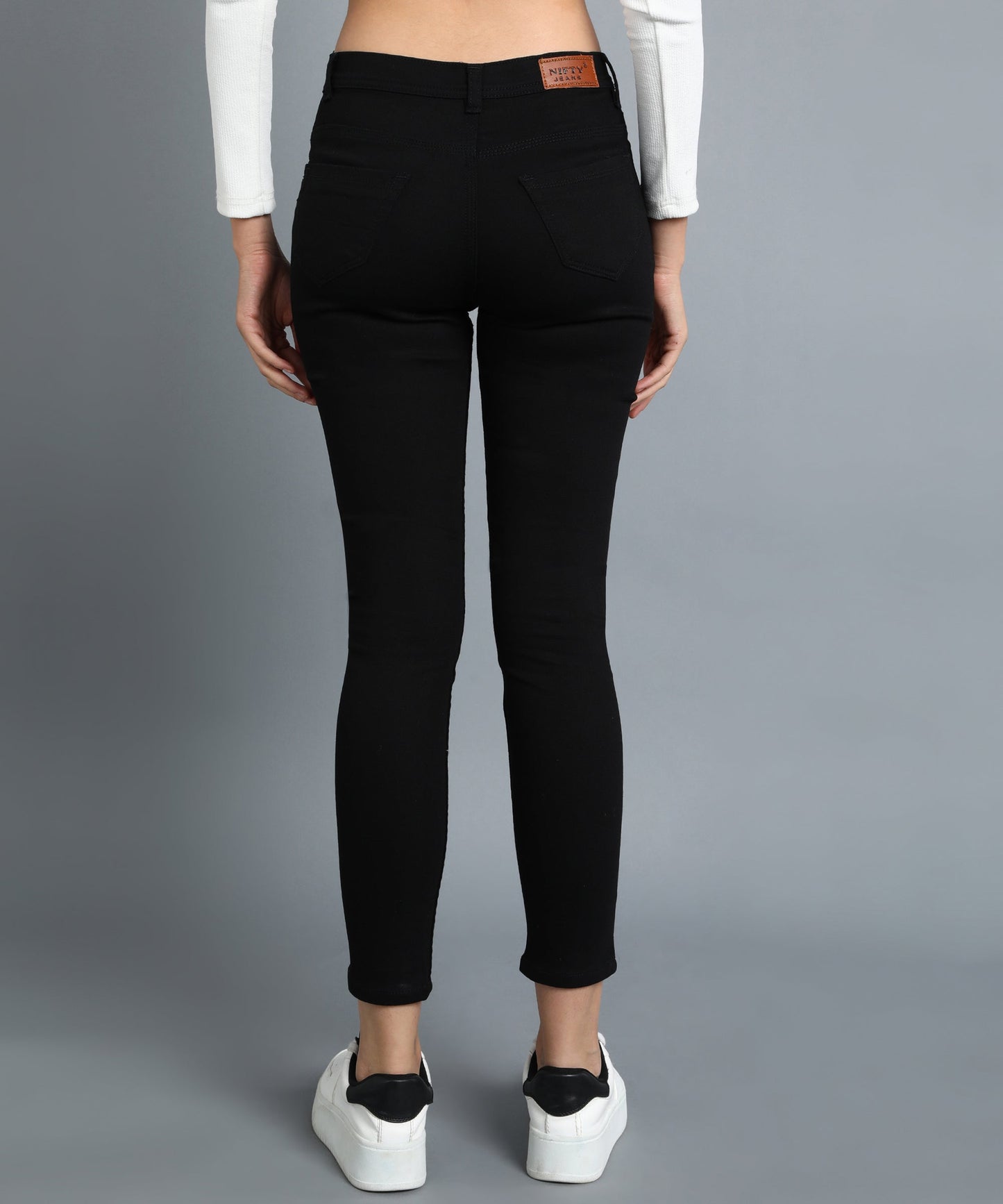 Jet black slim fit 5- pocket high rise jeans, clean look, zip fly with button closure, waistband with belt loops