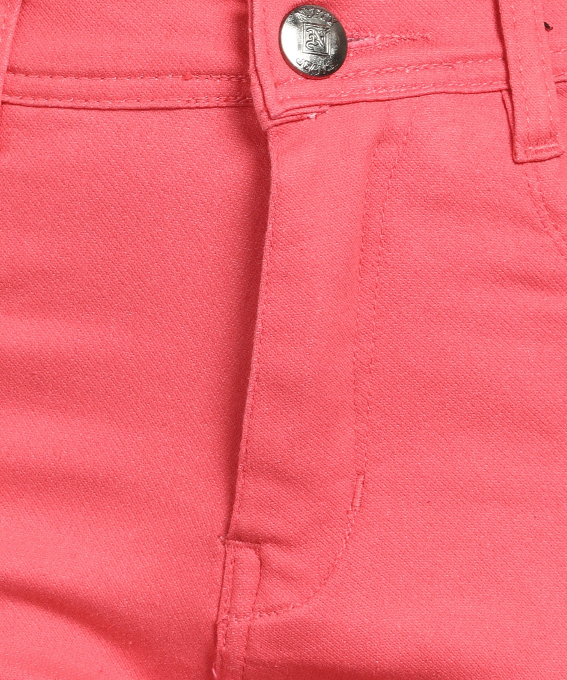 Red slim fit 5- pocket high rise jeans, clean look, zip fly with button closure, waistband with belt loops