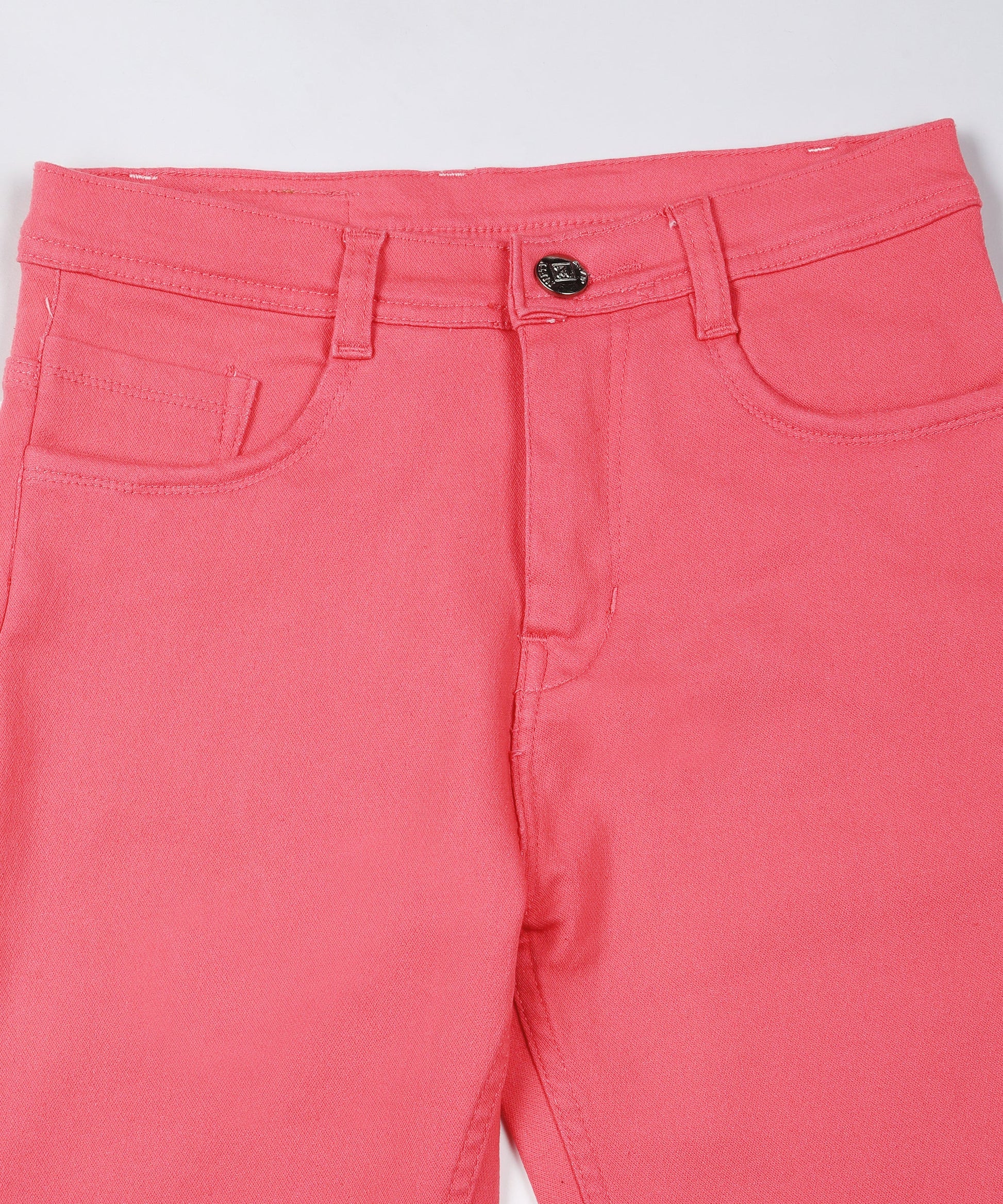 Red slim fit 5- pocket high rise jeans, clean look, zip fly with button closure, waistband with belt loops