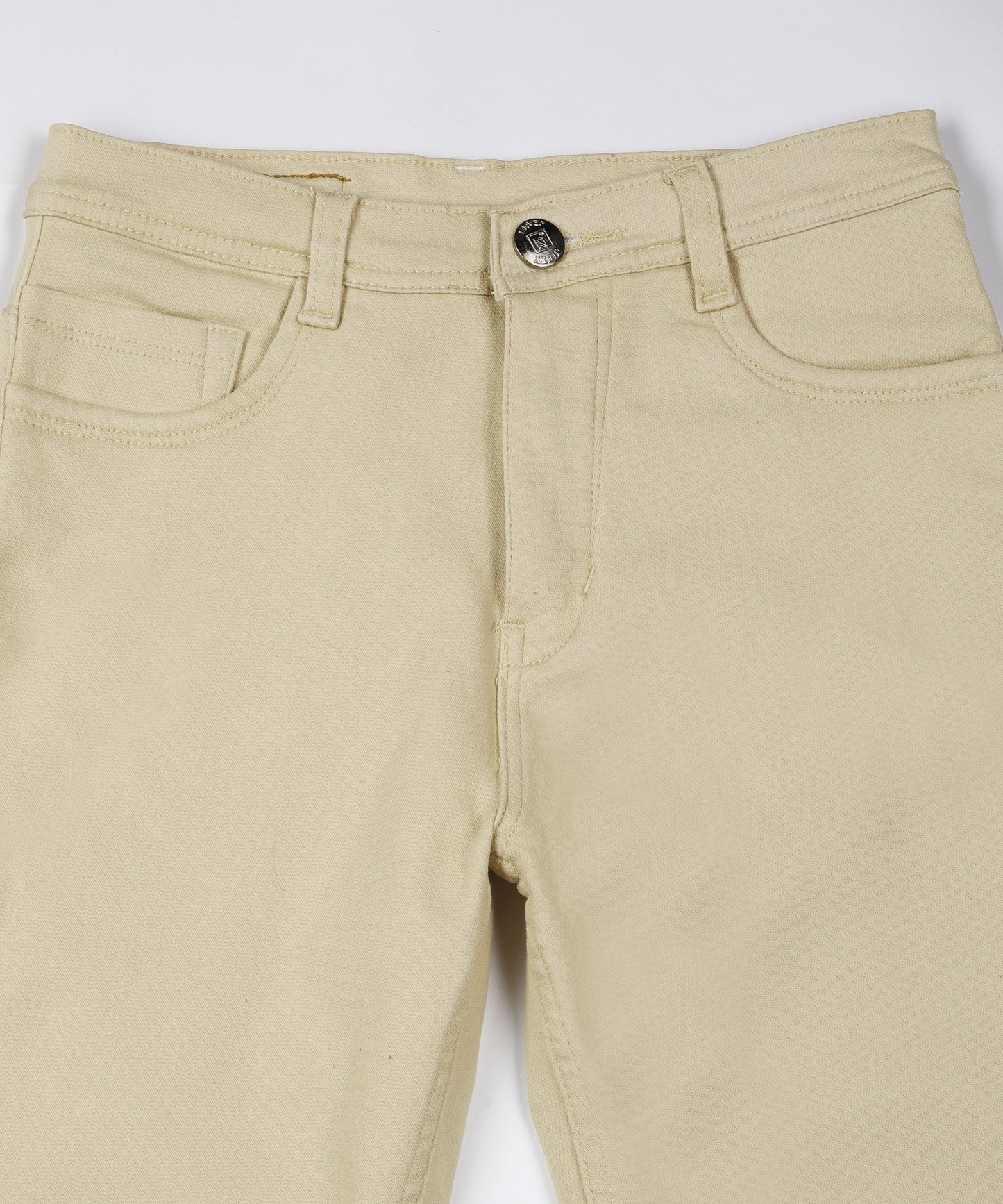 Beige slim fit 5- pocket high rise jeans, clean look, zip fly with button closure, waistband with belt loops