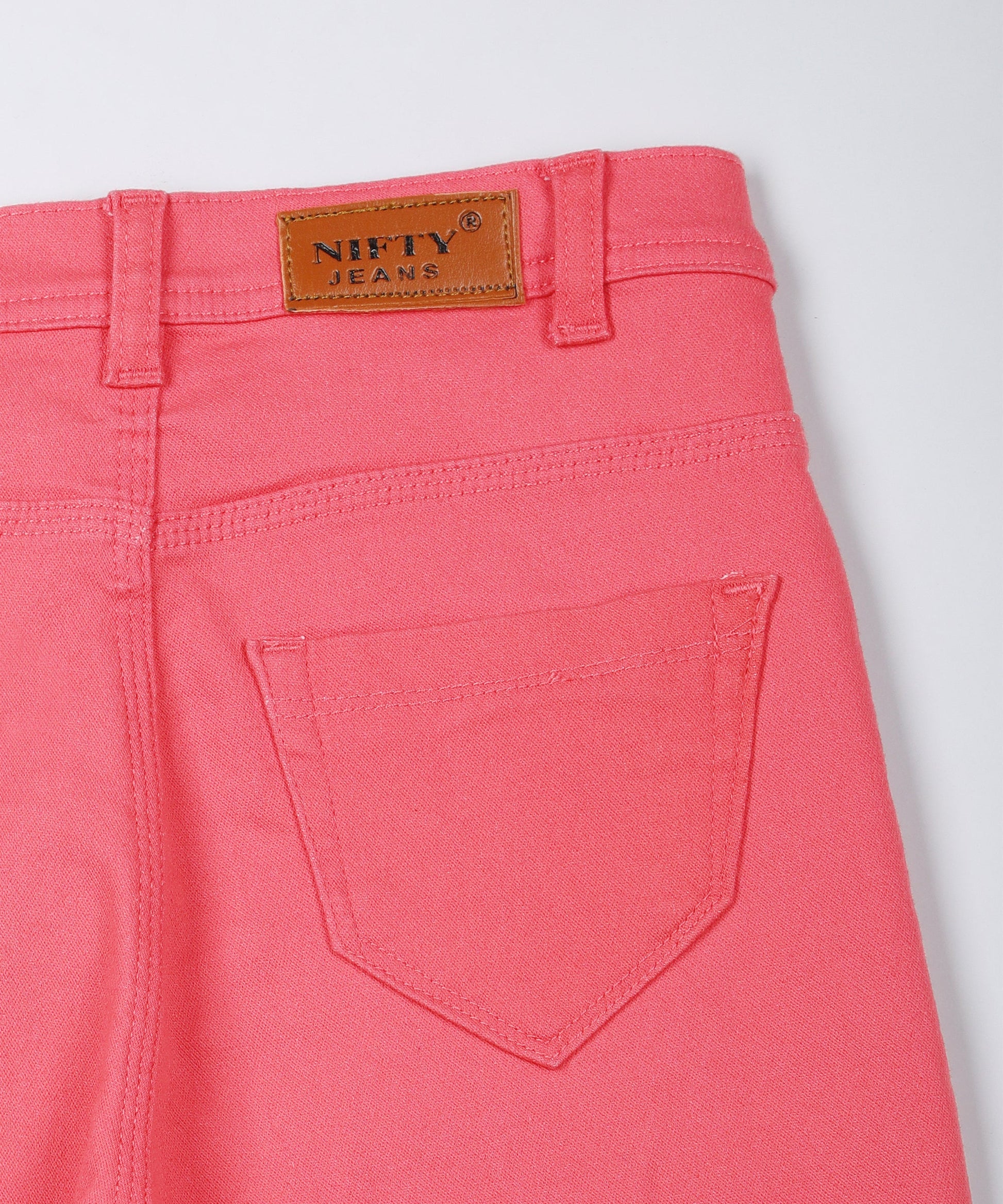 Red slim fit 5- pocket high rise jeans, clean look, zip fly with button closure, waistband with belt loops