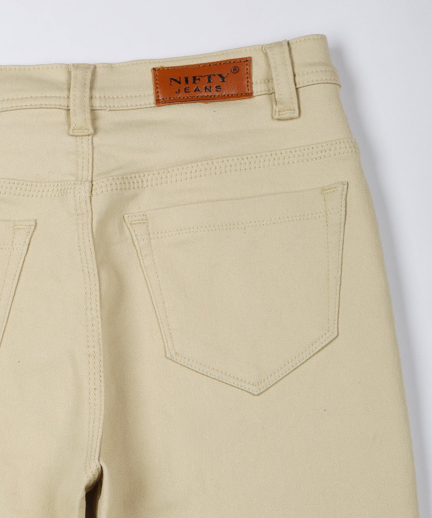 Beige slim fit 5- pocket high rise jeans, clean look, zip fly with button closure, waistband with belt loops