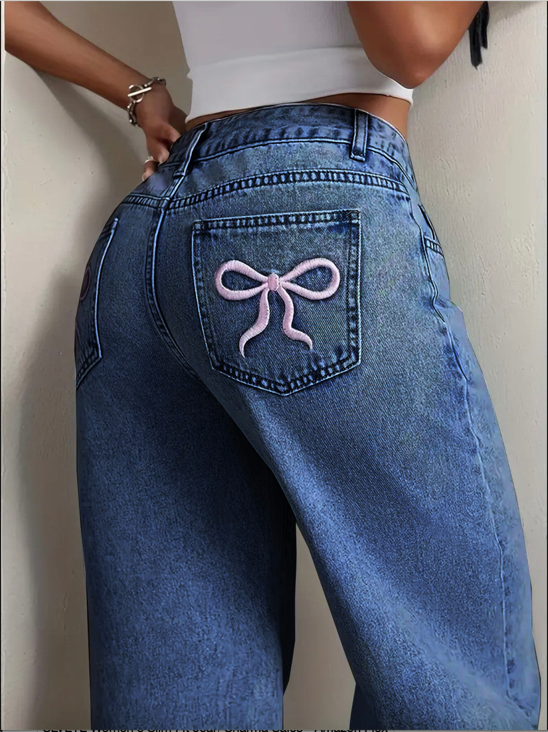 Relaxed Fit Jeans with pink bow tie at back pocket
