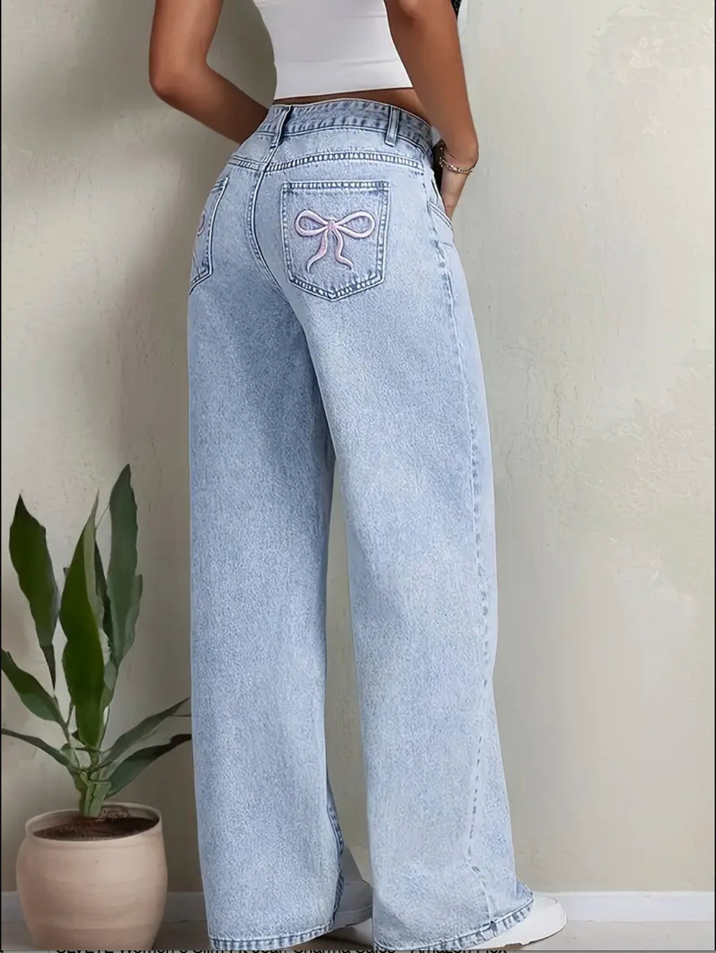Relaxed Fit Jeans with pink bow tie at back pocket