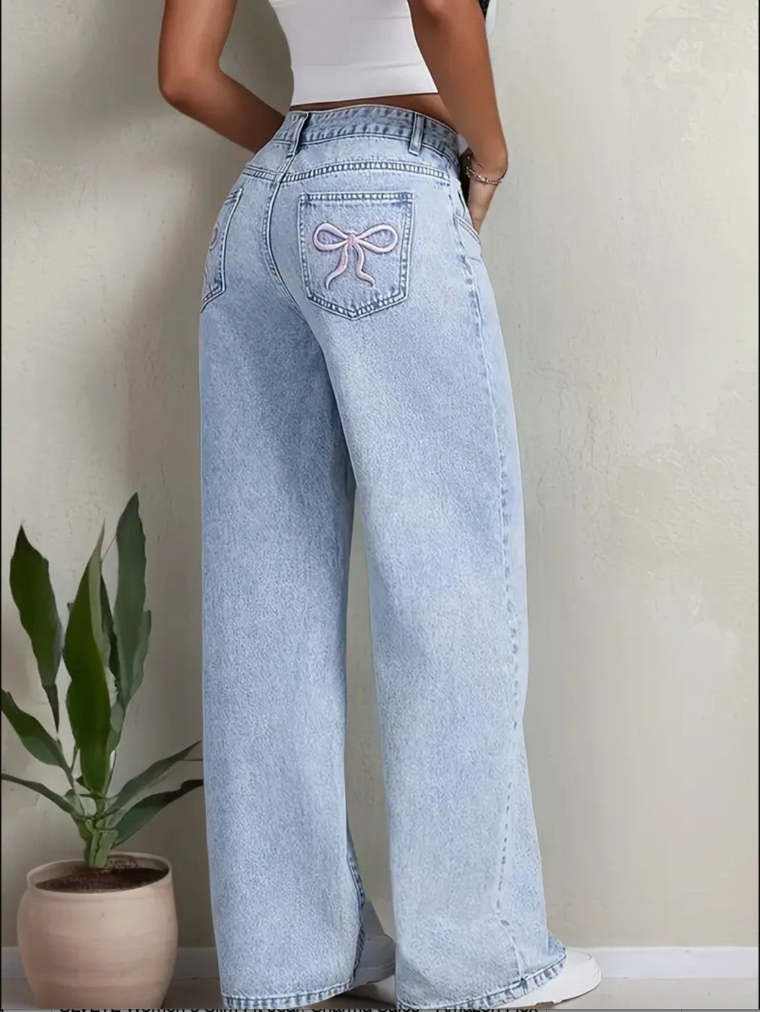 Relaxed Fit Jeans with pink bow tie at back pocket