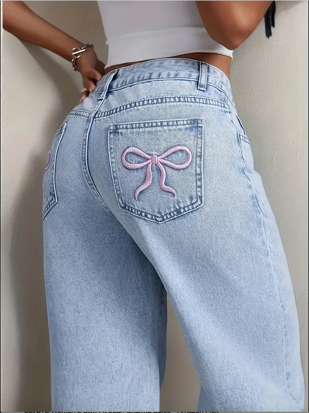 Relaxed Fit Jeans with pink bow tie at back pocket