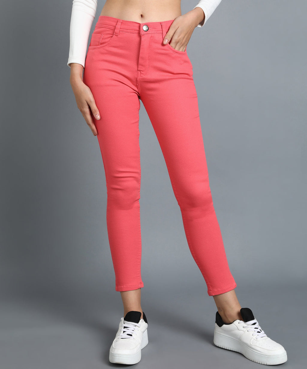 Red slim fit 5- pocket high rise jeans, clean look, zip fly with button closure, waistband with belt loops