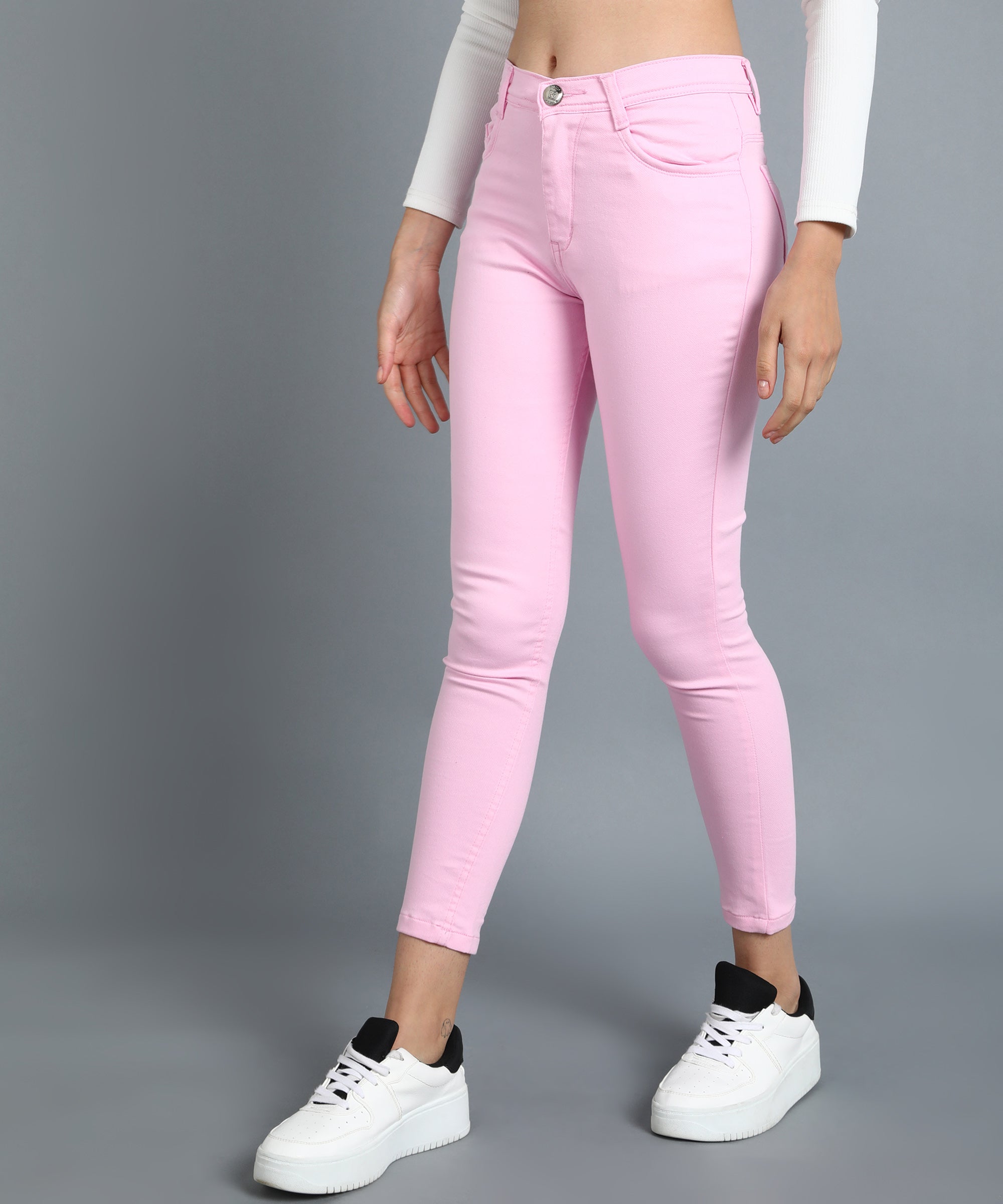 Pink slim fit 5- pocket high rise jeans, clean look, zip fly with button closure, waistband with belt loops