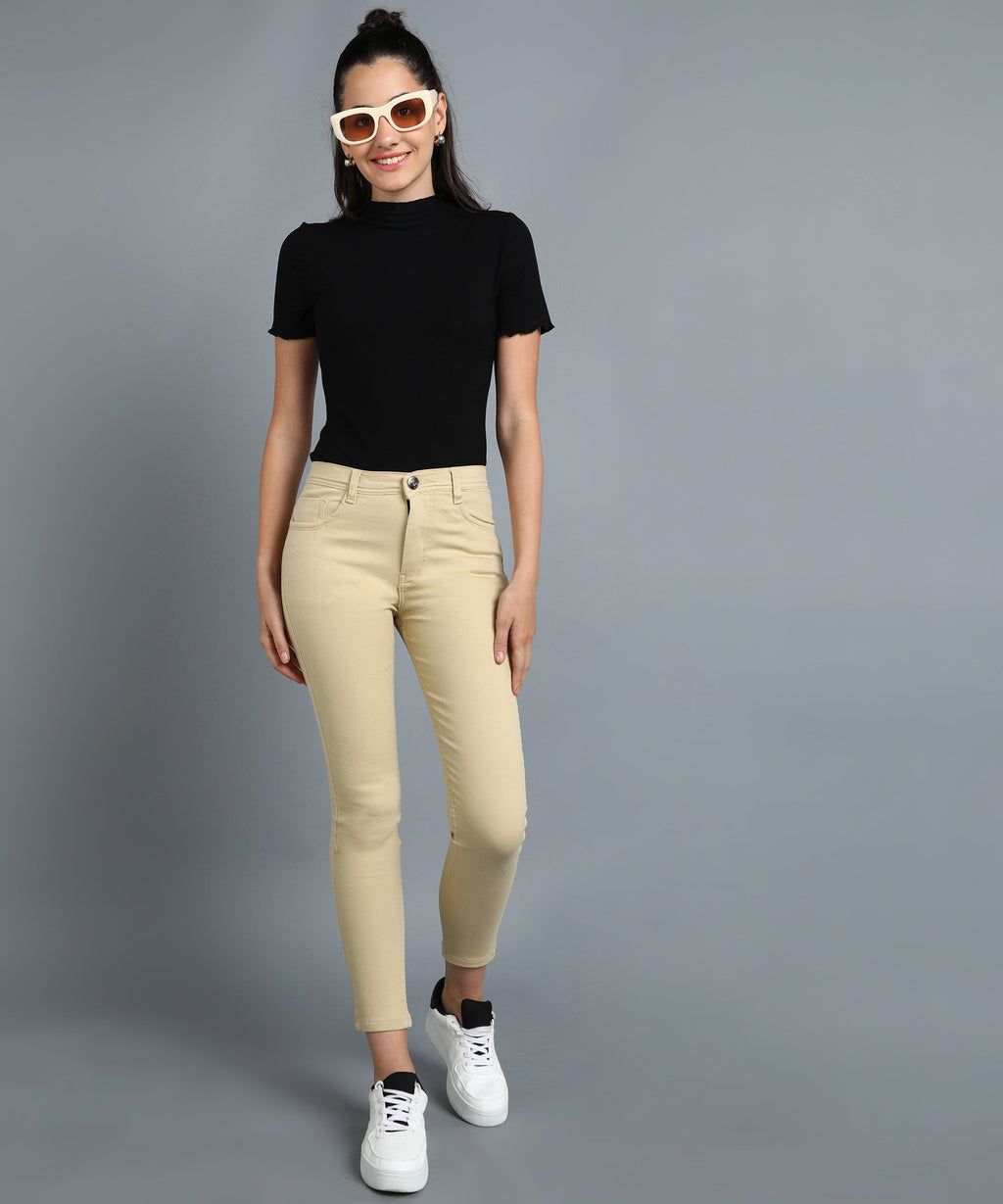 Beige slim fit 5- pocket high rise jeans, clean look, zip fly with button closure, waistband with belt loops