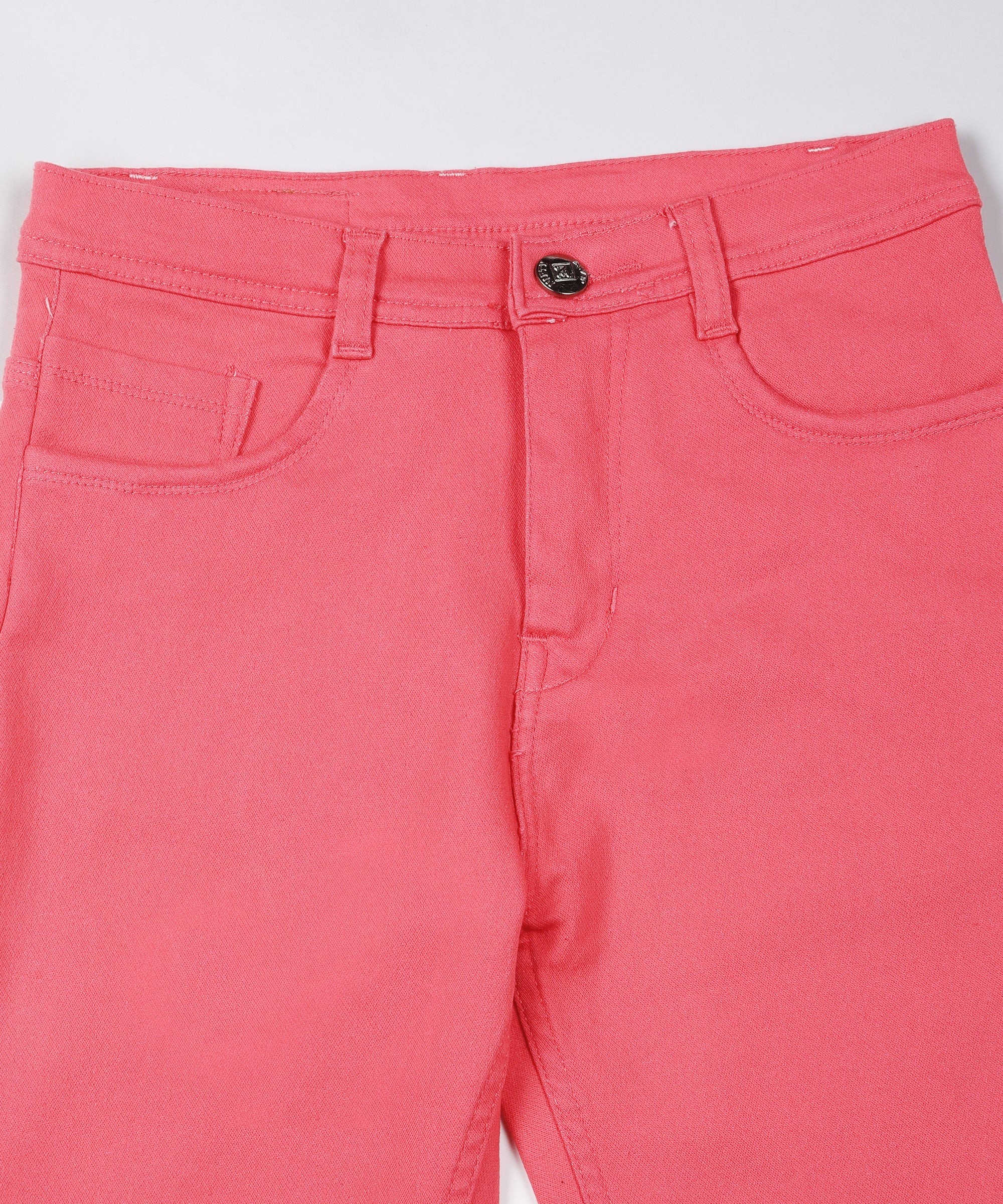 Red slim fit 5- pocket high rise jeans, clean look, zip fly with button closure, waistband with belt loops