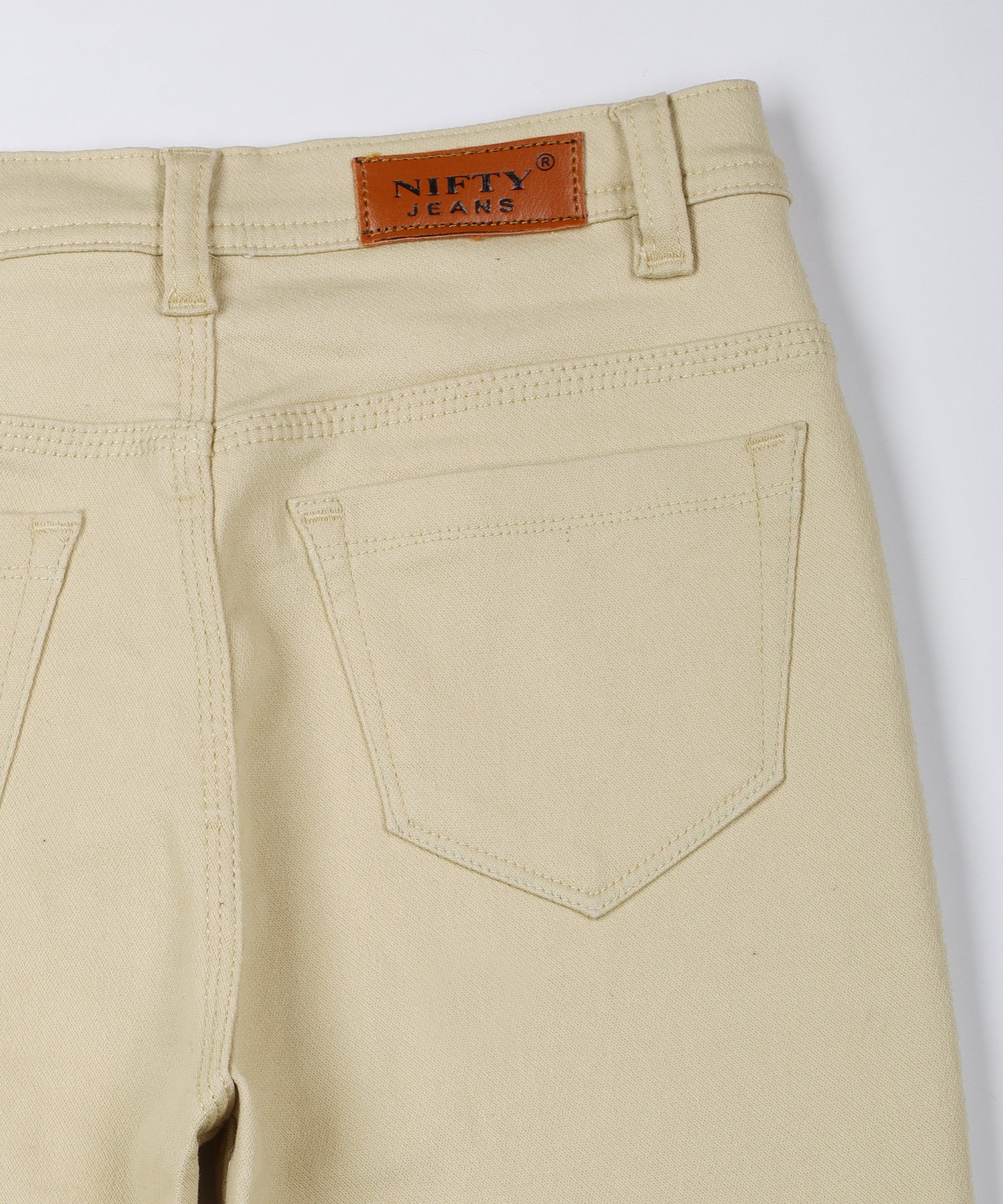 Beige slim fit 5- pocket high rise jeans, clean look, zip fly with button closure, waistband with belt loops